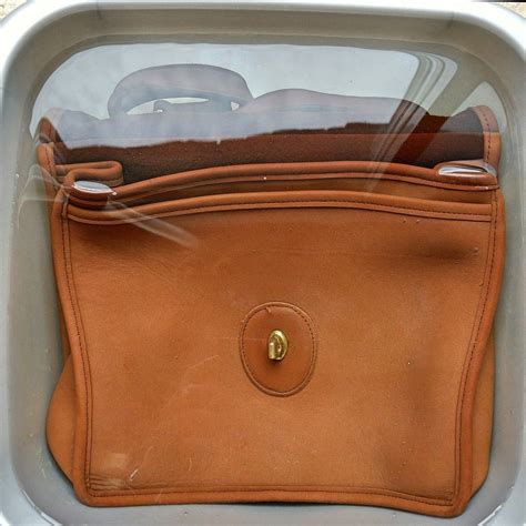 how to clean coach purse|refurbish my coach bag.